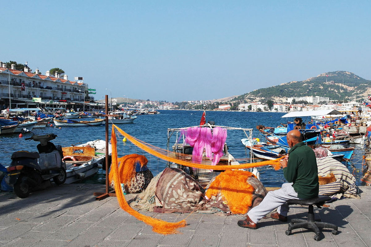 Ibo is fixing the fishing nets